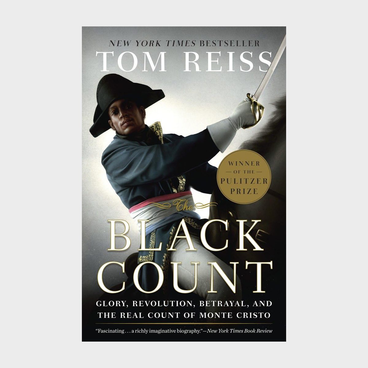 A man in historical uniform brandishes a sword; he is on horseback. The book cover says: "The Black Count" by Tom Reiss, Pulitzer Prize winner.