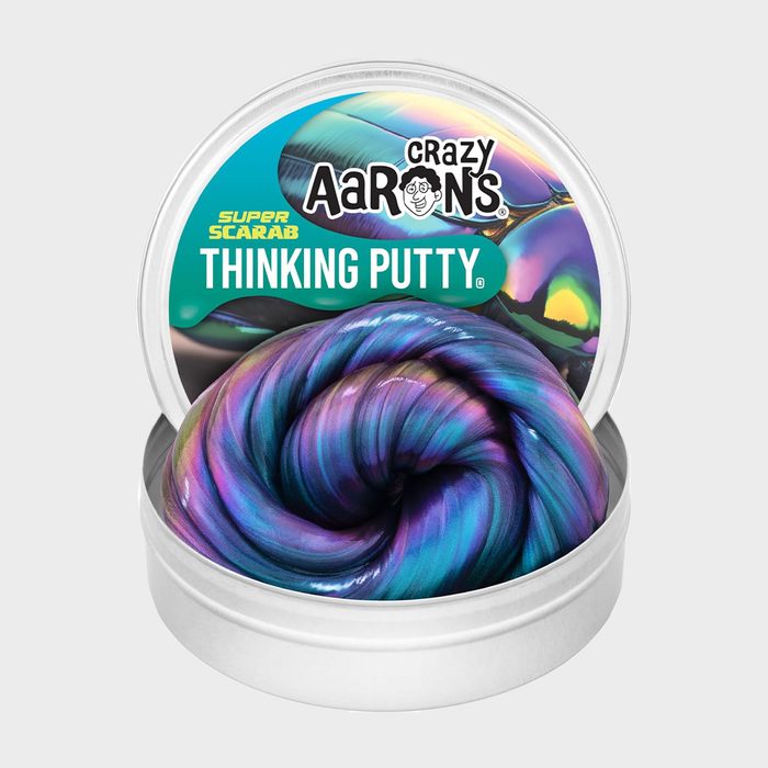 Tin contains colorful, swirled putty; label reads 