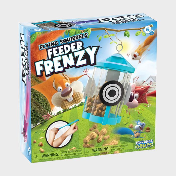 Box displaying colorful squirrels leaping towards a hanging feeder filled with nuts, against a grassy outdoor background. Text: 