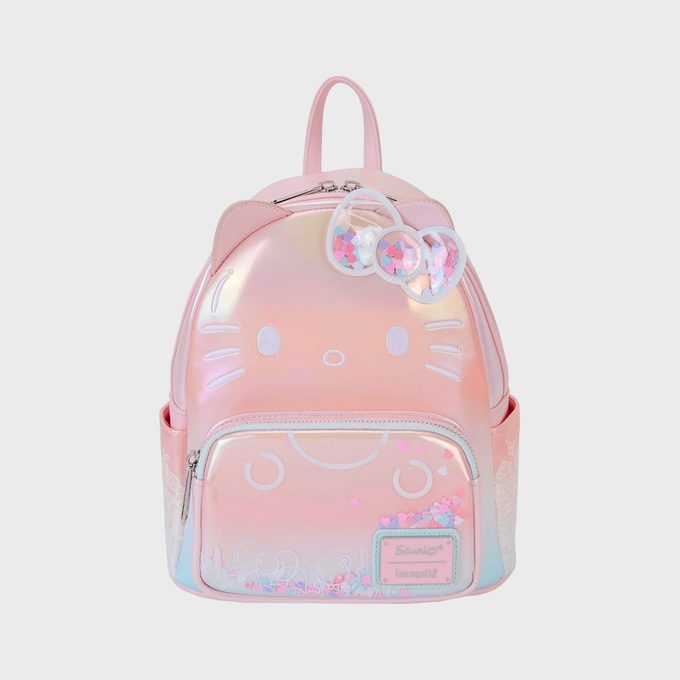 Backpack features a pastel pink gradient, with a cat face design. It has a front pocket, heart-shaped sequins, and 