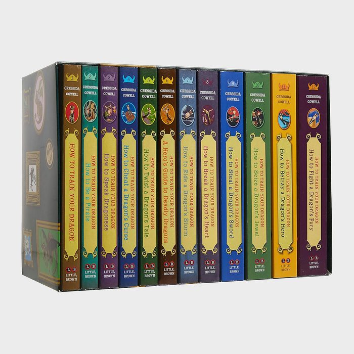 Boxed book set stands upright, displaying colorful spines. Titles include 