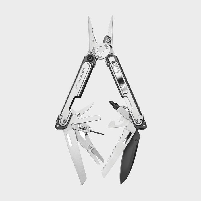 Multitool displaying open pliers, knives, and other tools in fan arrangement on a plain white background. 
