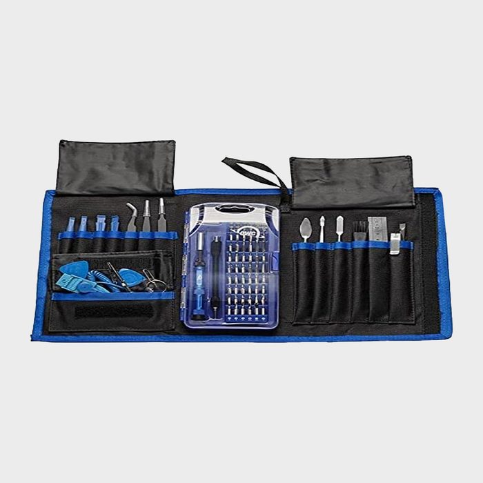 Toolkit featuring precision screwdrivers and varied tools arranged in a black folding case, opened on a flat surface, displaying components neatly organized.