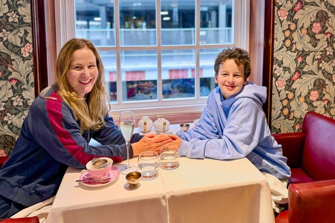 woman and her son having tea