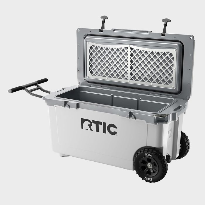Cooler with wheels and handle open, displaying a spacious interior; placed against a plain background. Text: 
