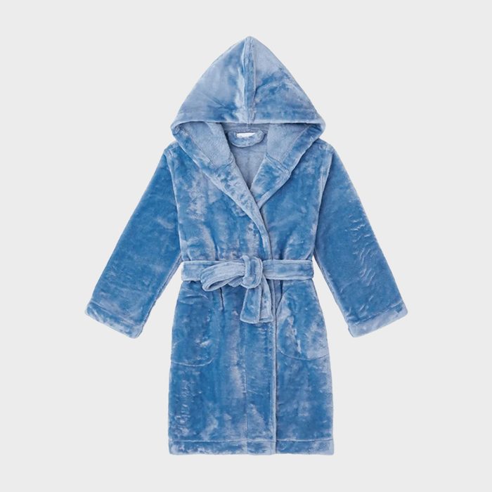 Blue plush robe hangs, hooded with a belt tied at the waist, against a plain white background.
