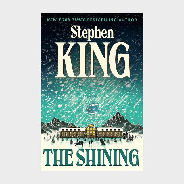 Book cover shows a hotel in snow, with figures approaching, against snowflakes and mountains. Text: 