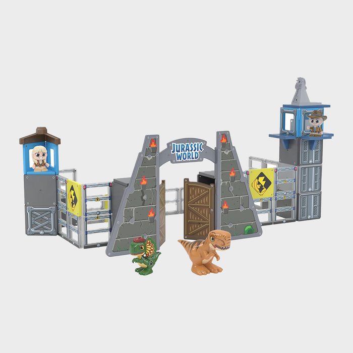 Playset displays dinosaurs exiting a 