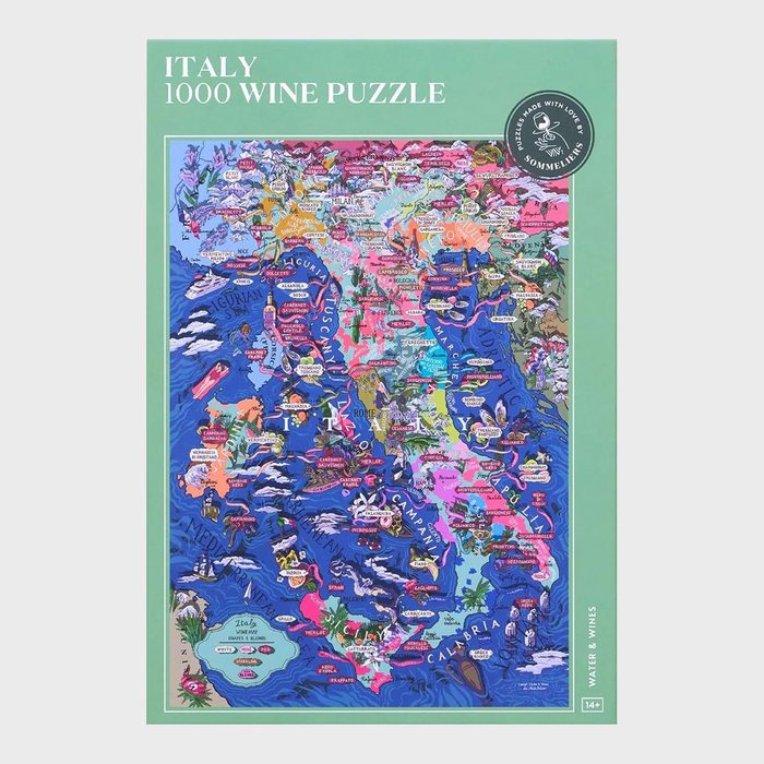 Puzzle displays detailed map of Italy's wine regions, featuring vibrant colors and intricate labels, packaged in a green-bordered box. Text includes 