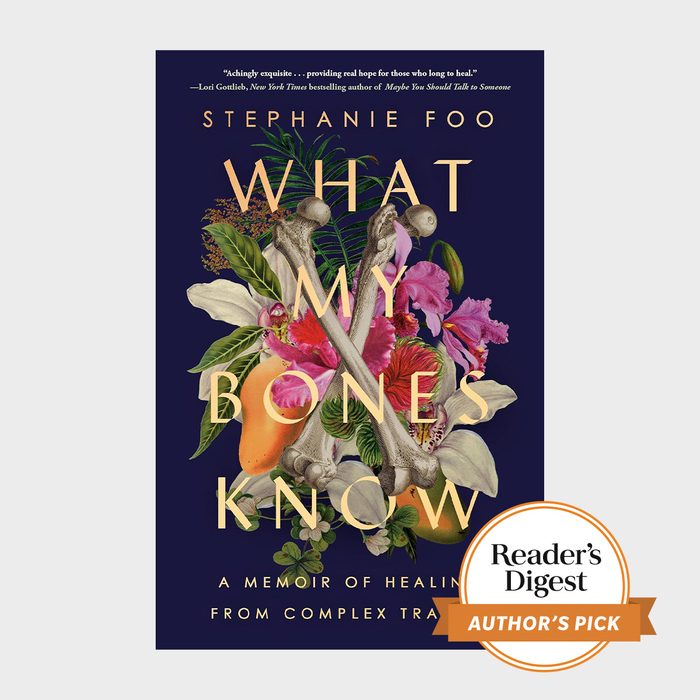 Book cover displays crossed bones over flowers. Title: 