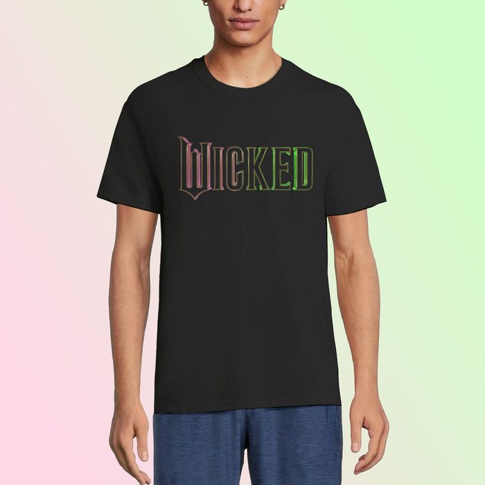 Person wearing a black T-shirt with 