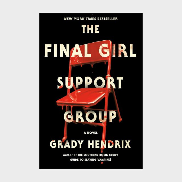 Red chair sits with dripped paint, positioned against a black backdrop. Text reads: 