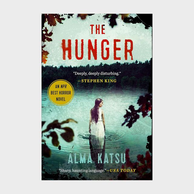 Woman stands in water, surrounded by a dark forest. Text reads 