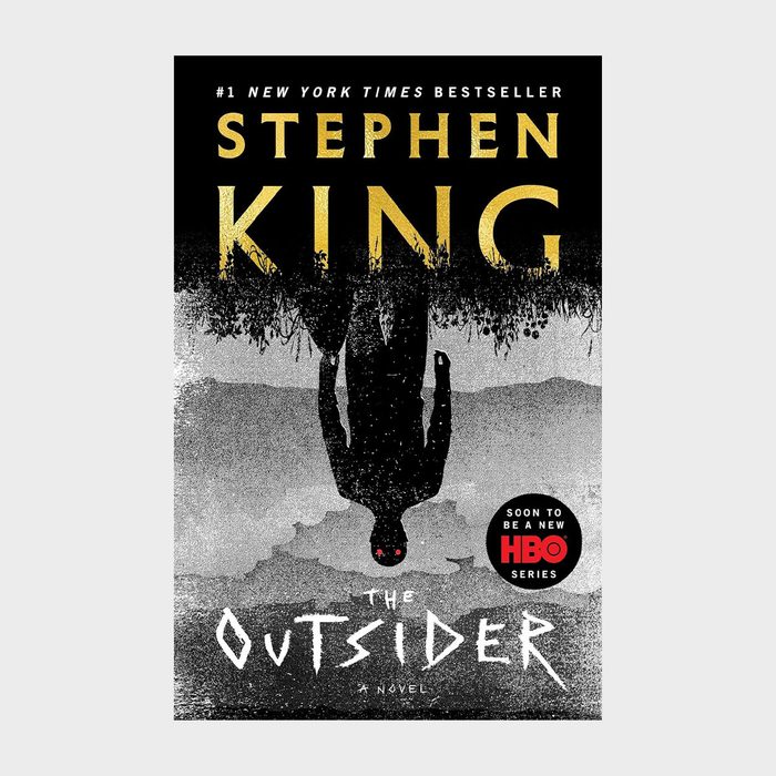 Silhouette hangs upside down against textured background; text reads 