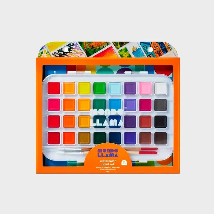 A watercolor palette displays multiple vibrant colors arranged in rows, set inside an orange-bordered packaging with artistic designs. Includes two paintbrushes.