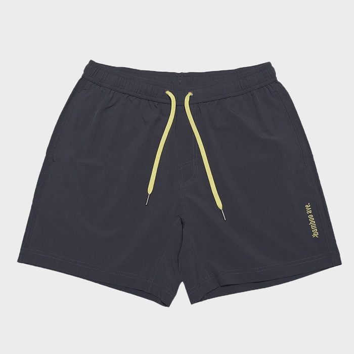 Dark shorts feature yellow drawstrings; 