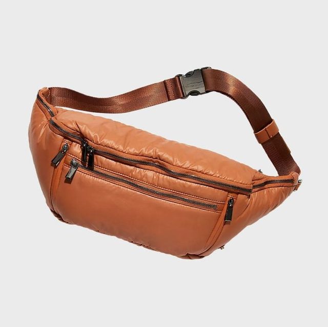 A brown waist bag displays multiple zippered pockets and an adjustable strap against a plain white background.