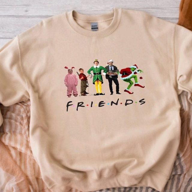 Sweatshirt depicts costumed characters standing, with 