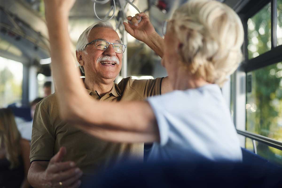 A couple taking the bus.