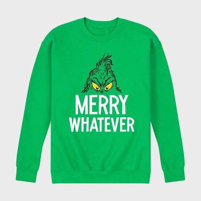 Green sweatshirt features cartoon face, text reads 