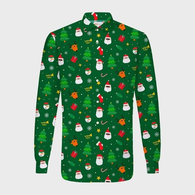 Green shirt displays Christmas-themed icons including Santa faces, Christmas trees, reindeer, presents, and snowflakes on a plain white background.