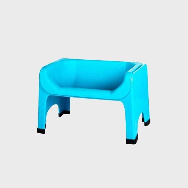 Bright blue elevated pet bowl stand sits on a plain gray background.
