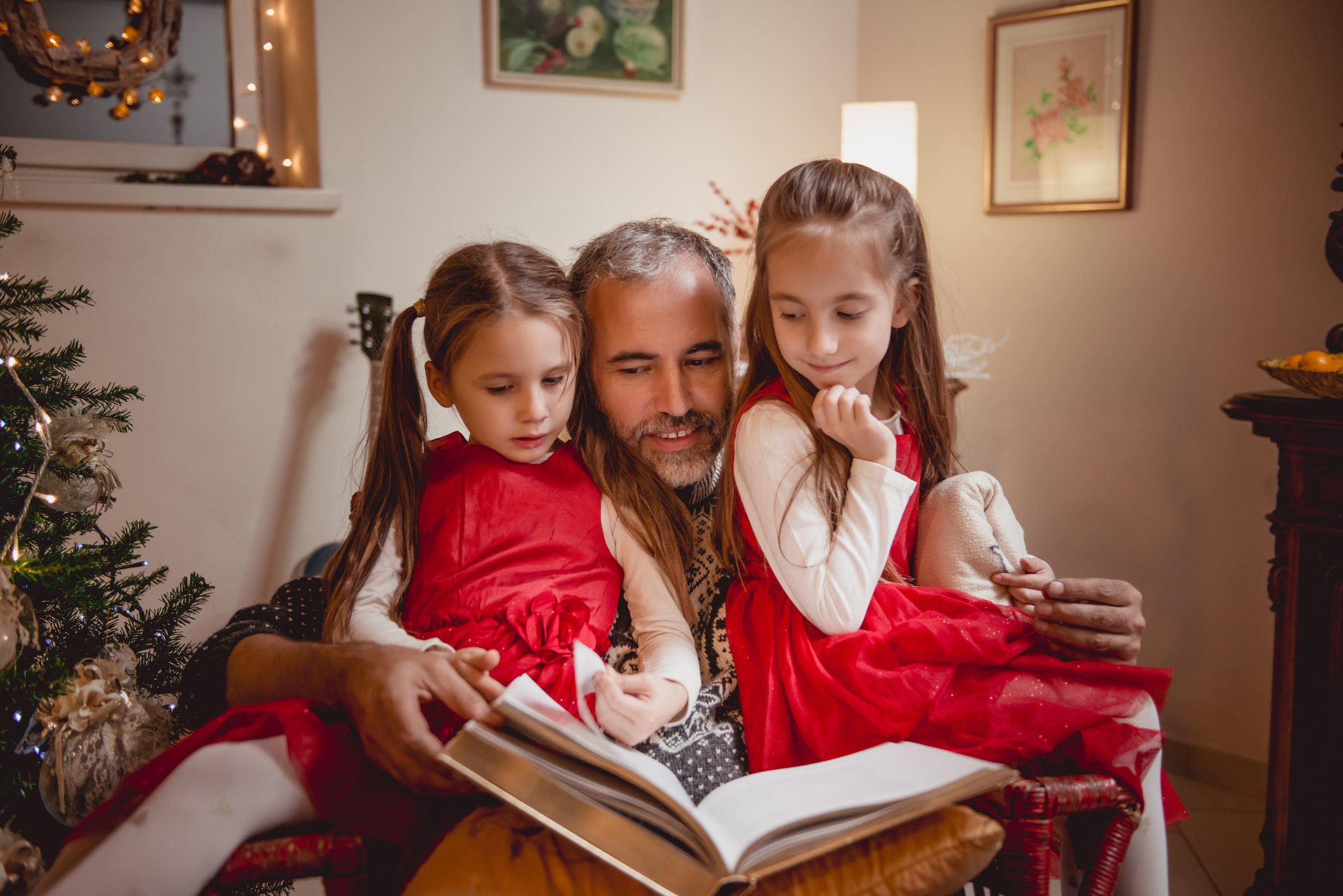 Father reading Fairy tales on Christmas