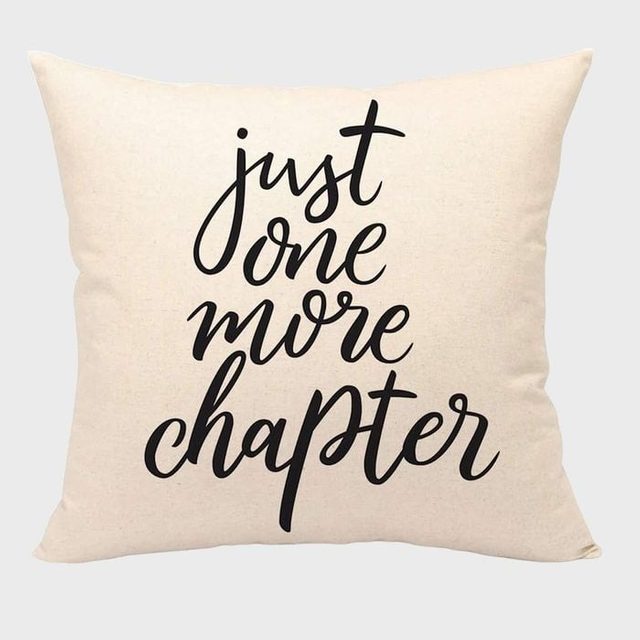 Pillow features cursive text 