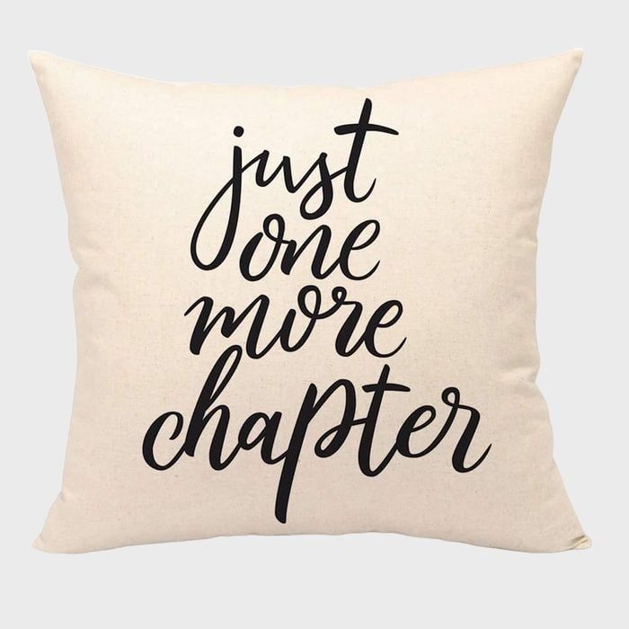 Pillow features cursive text 
