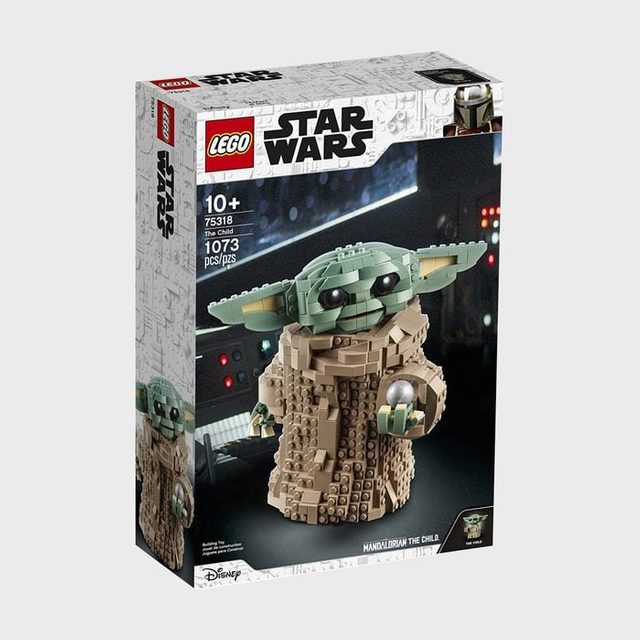LEGO baby alien figure displayed on a box, surrounded by a Star Wars-themed space background. Text reads, 
