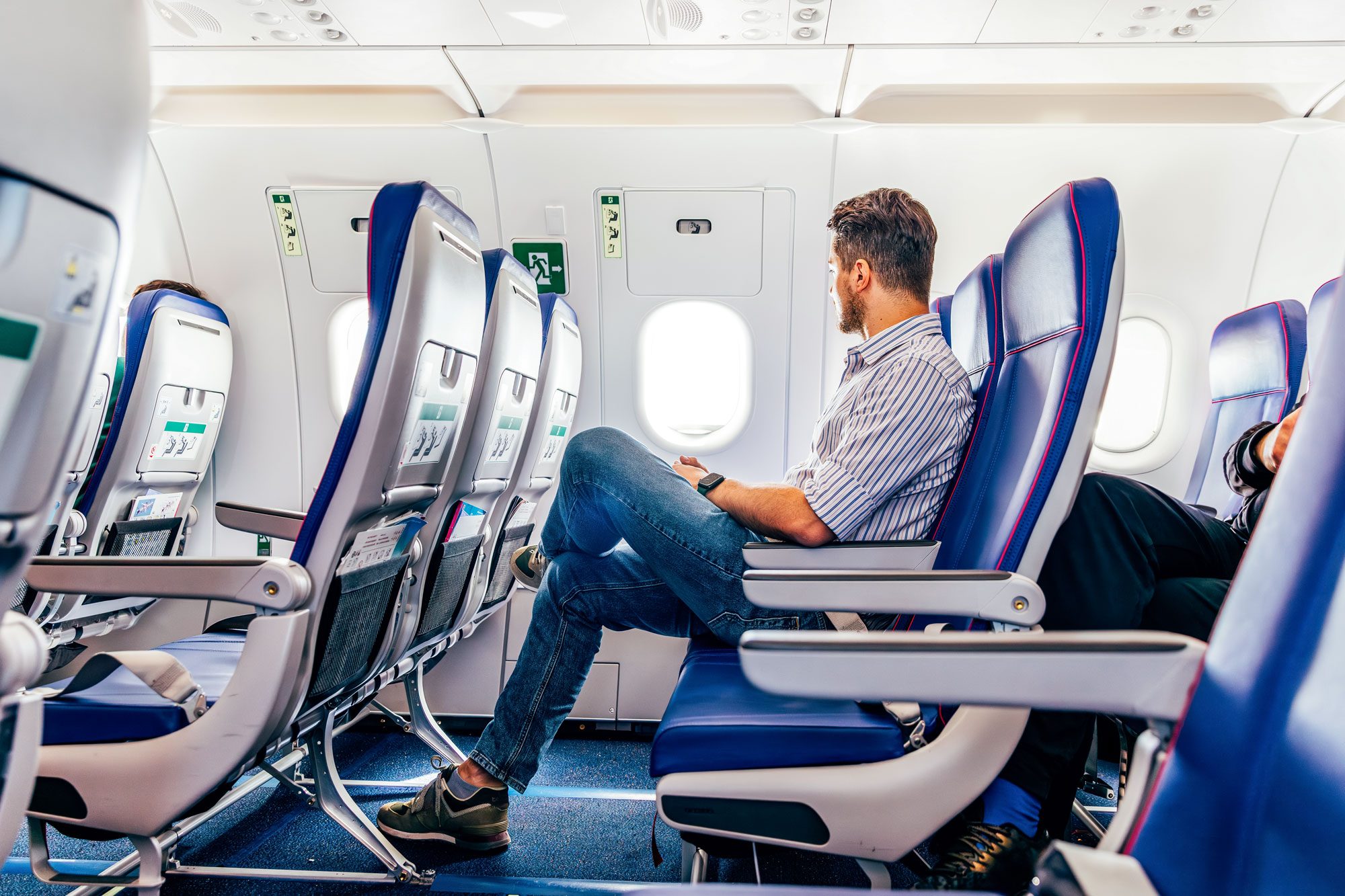 Get Extra Legroom on Your Next Flight for Free with This Viral Travel Hack
