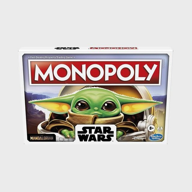 The box features Monopoly game showcasing a character from Star Wars, Mandalorian, with branding and recommended for ages 8+, by Disney and Hasbro.