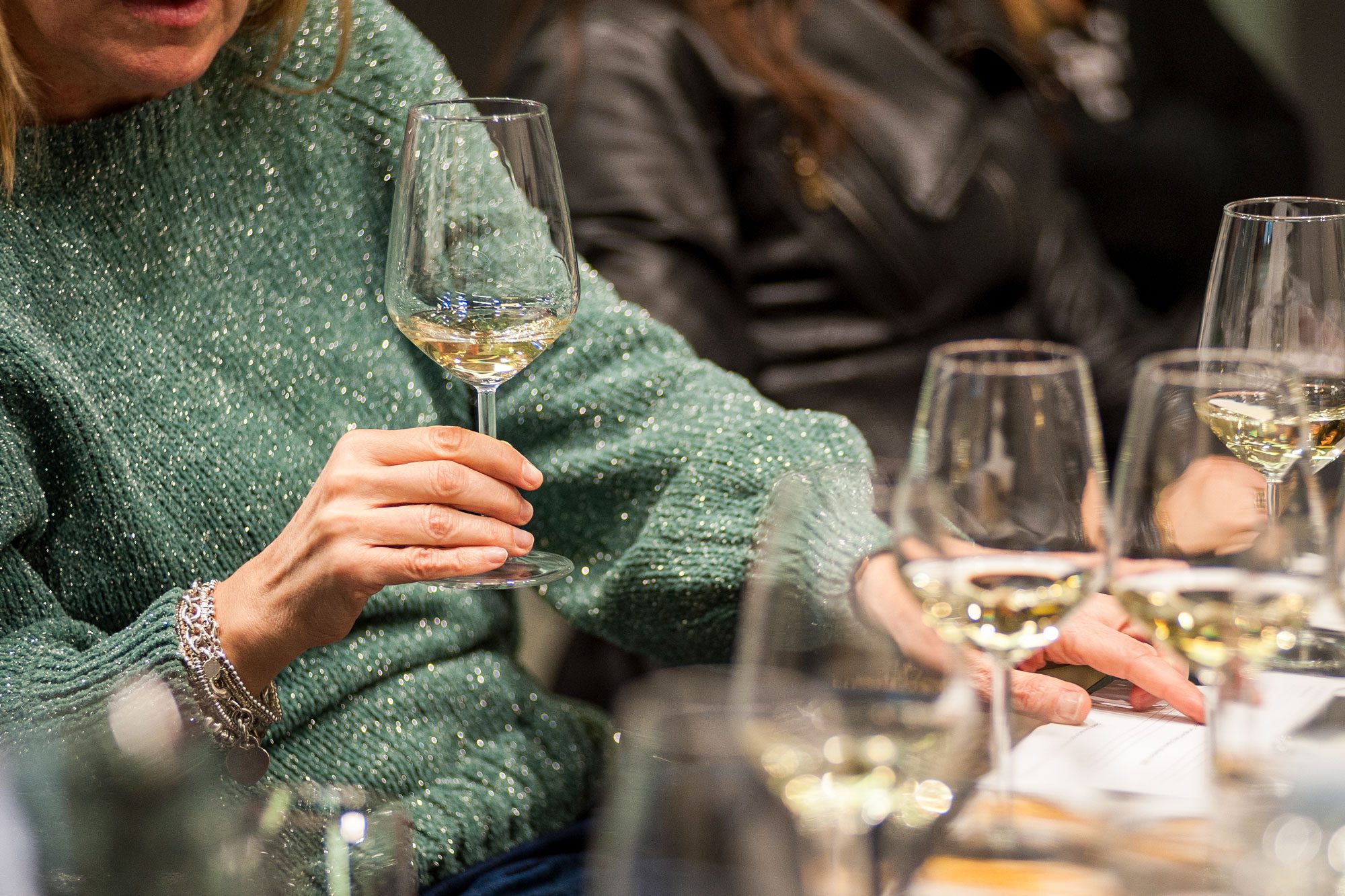 People Tasting White Wine