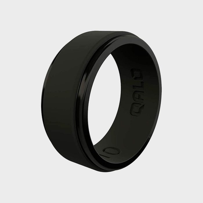 Black silicone ring standing upright; engraved text 