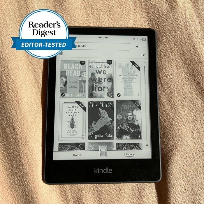 Kindle displays various book covers, including 