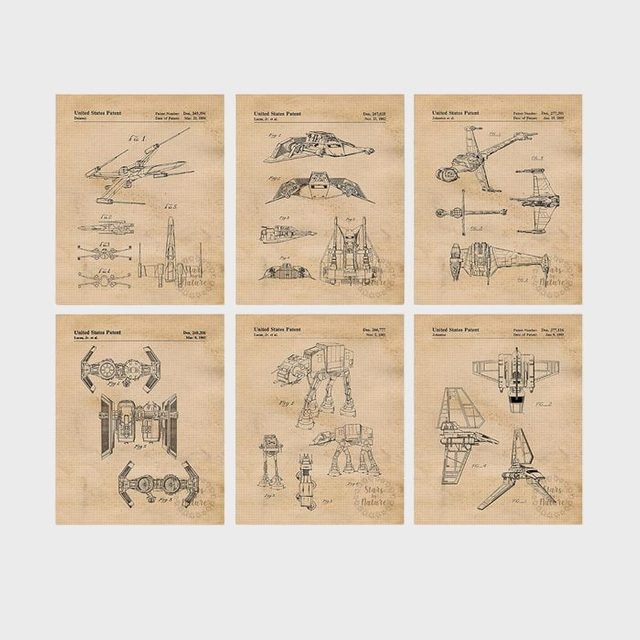 Blueprints showcase detailed spacecraft diagrams, arranged on vintage-style paper, labeled with 