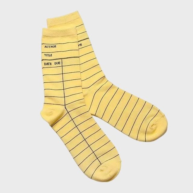 Yellow socks display a library card pattern with lines and text 