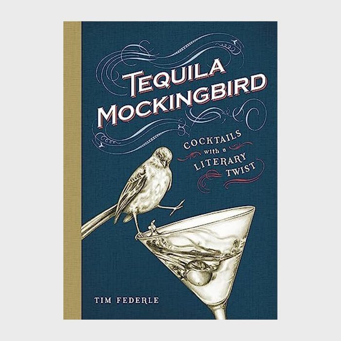 A bird perches on a martini glass beneath swirling text, with a navy background. Text reads: 