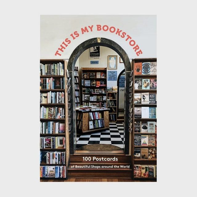 An arched bookstore entrance displays shelves filled with books; text reads 