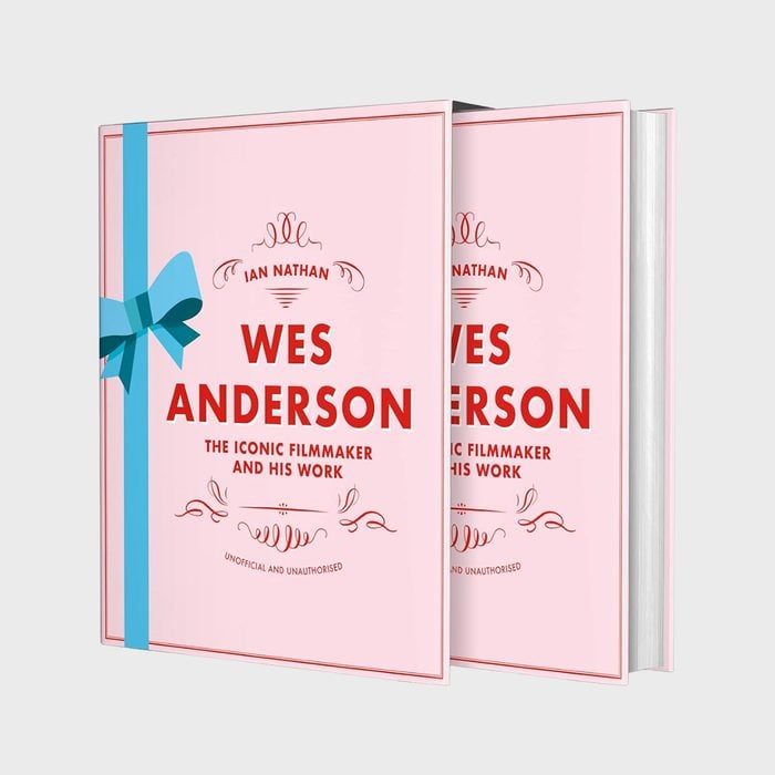 Book features pink cover with bold red text, 