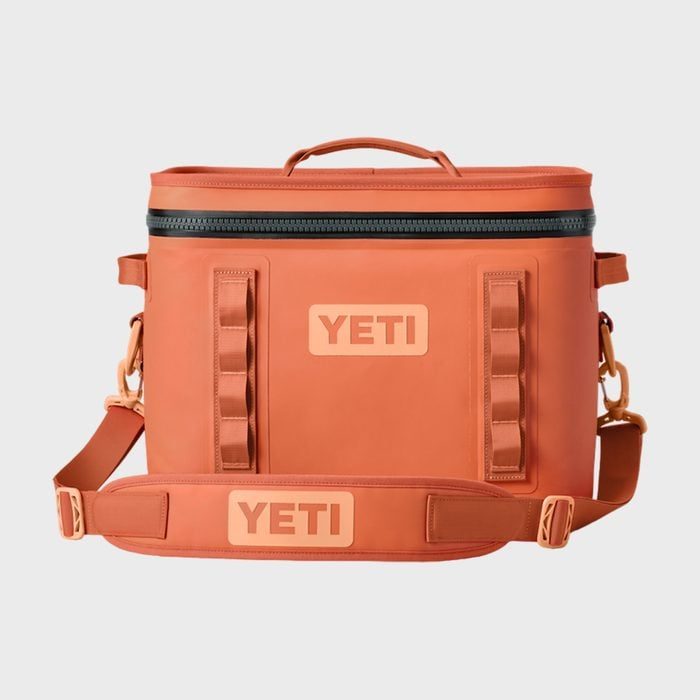 Orange cooler bag with a zipper and shoulder strap, displaying 
