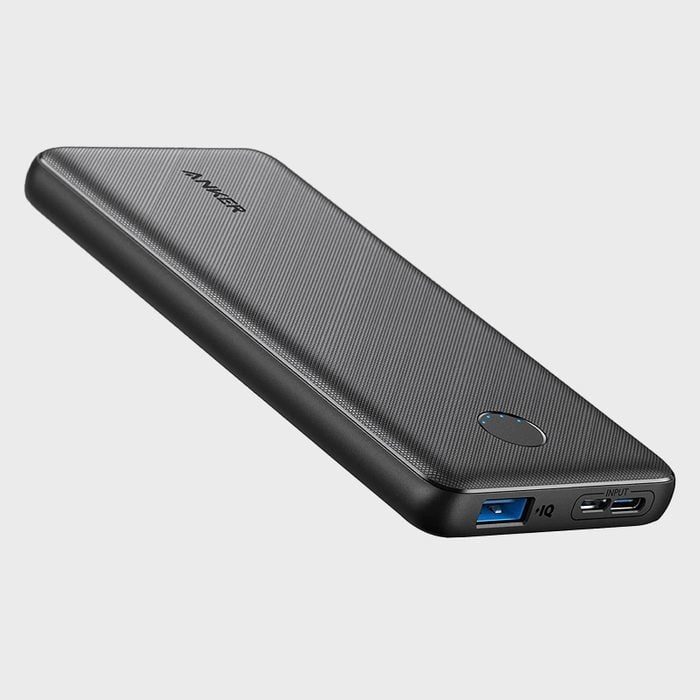 A sleek black power bank with ports visible, displaying an 