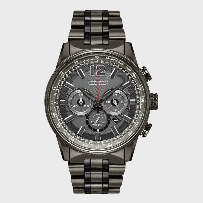 Watch displaying time with three sub-dials and metallic bracelet; features 