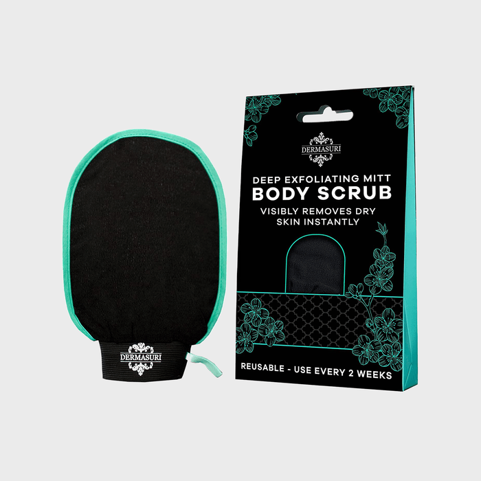 Body scrub mitt sits beside packaging, emphasizing deep exfoliation; text highlights instant dry skin removal, reusable bi-weekly. Floral design adorns black and green box.