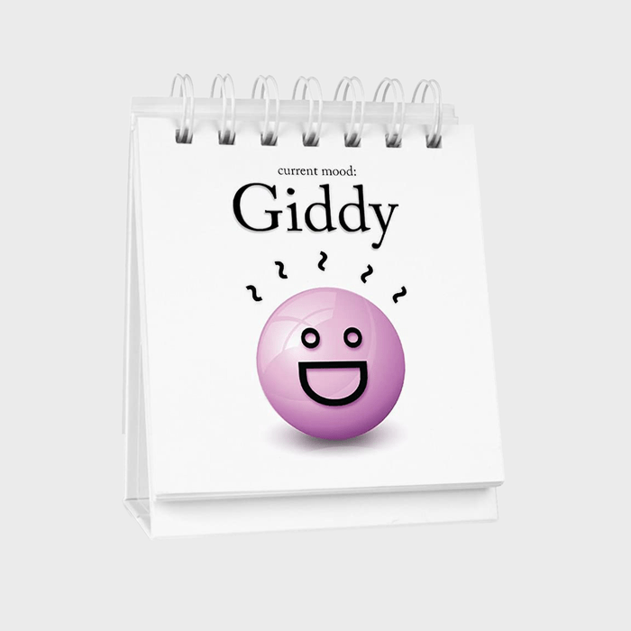 Calendar displays a giddy mood with a smiling purple face, surrounded by wavy lines, on a white background.