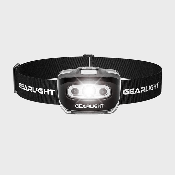 Headlamp illuminating, fixed on adjustable black strap with 