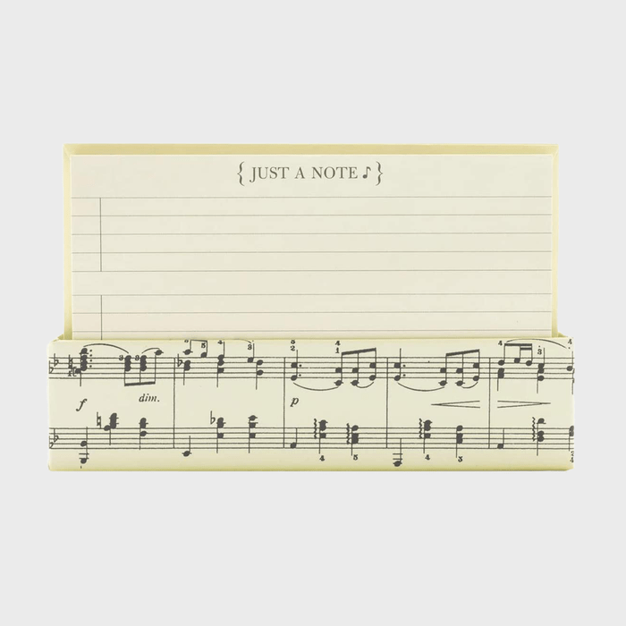Box with lined paper inside, labeled 