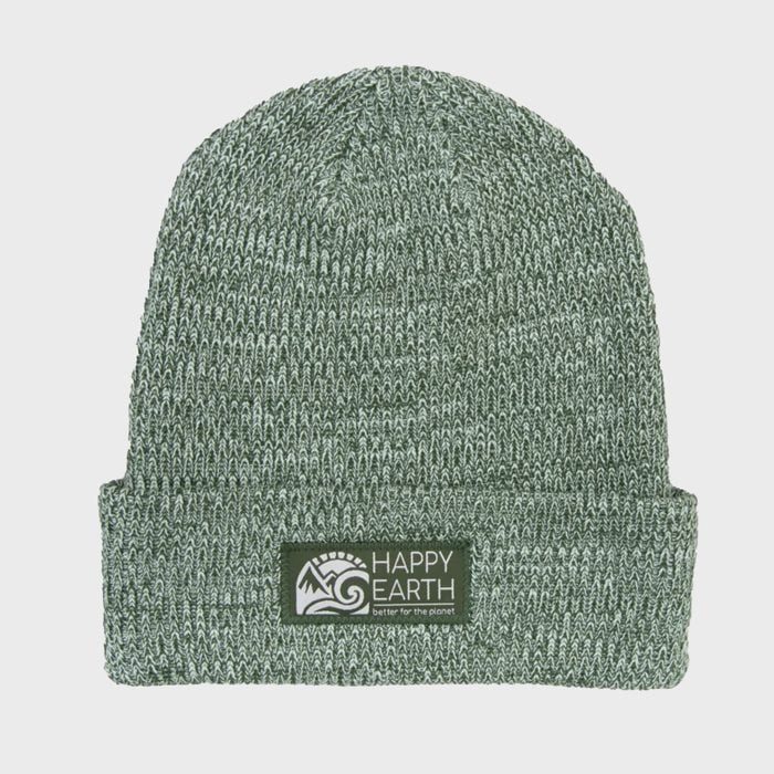Green knitted beanie cap displays a label with 