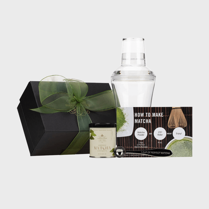 Matcha set includes a black gift box, glass shaker, matcha tin, spoon, and instruction card. Instructions: Matcha powder, 175Â°F water, whisk, enjoy.