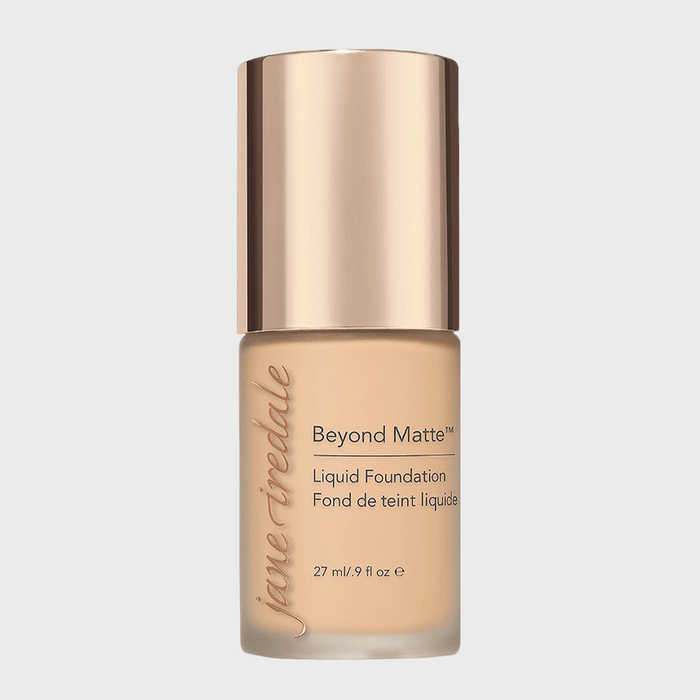 Foundation bottle stands upright, labeled 